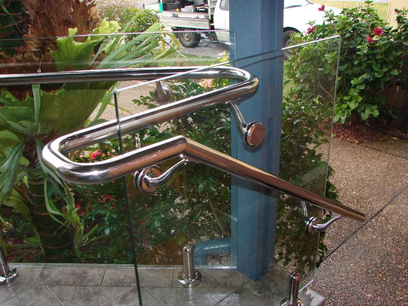 Frameless Glass for external balcony including stainless steel handrail.