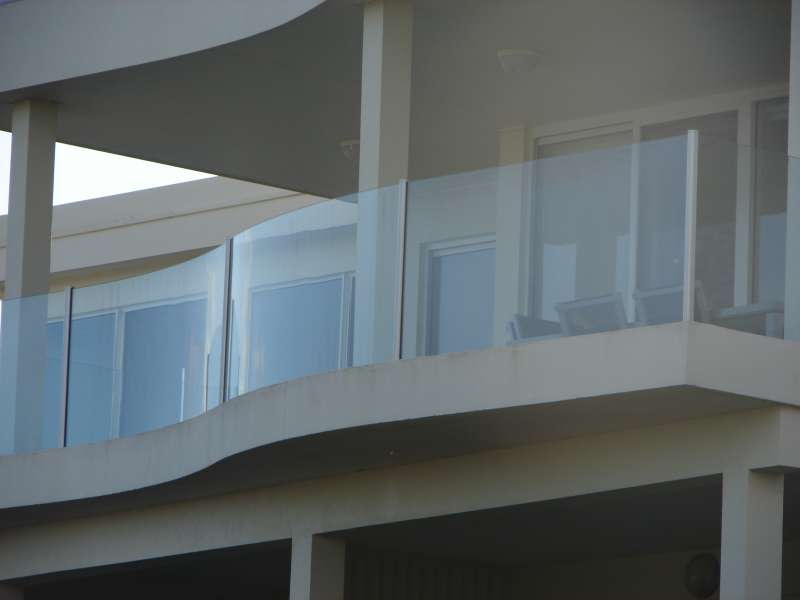 Curved Frameless Glass on Balcony.